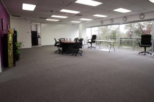 Knowbility meeting room with big windows.